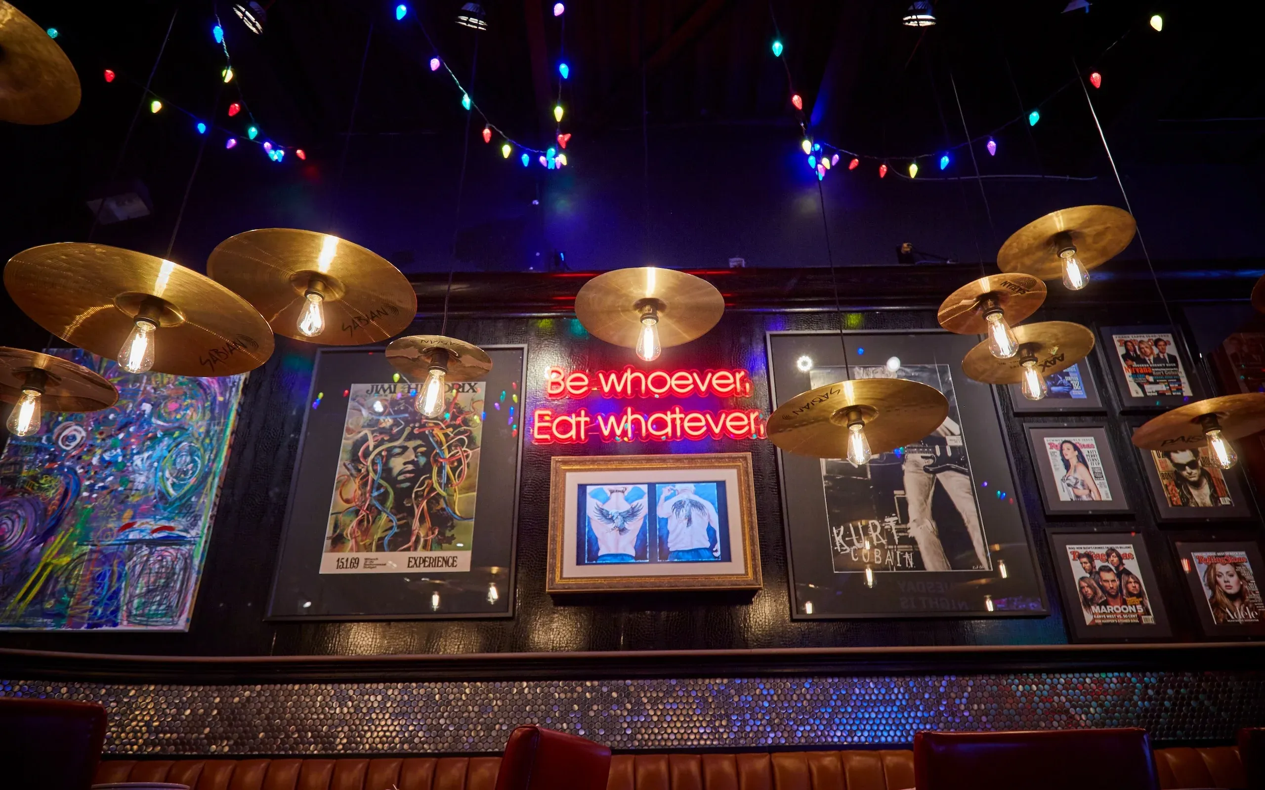 Close-up of provocative "Be whatever, eat whatever" brand messaging integrated into the new Jack Astor's interior wall design