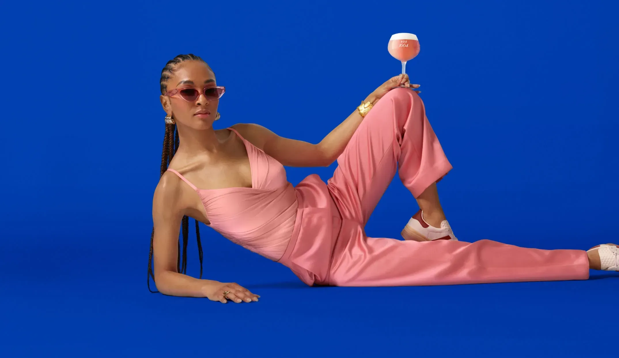 monochromatic pink, blue fashion photography for 1664 kronenbourg rosé drink fashionably campaign