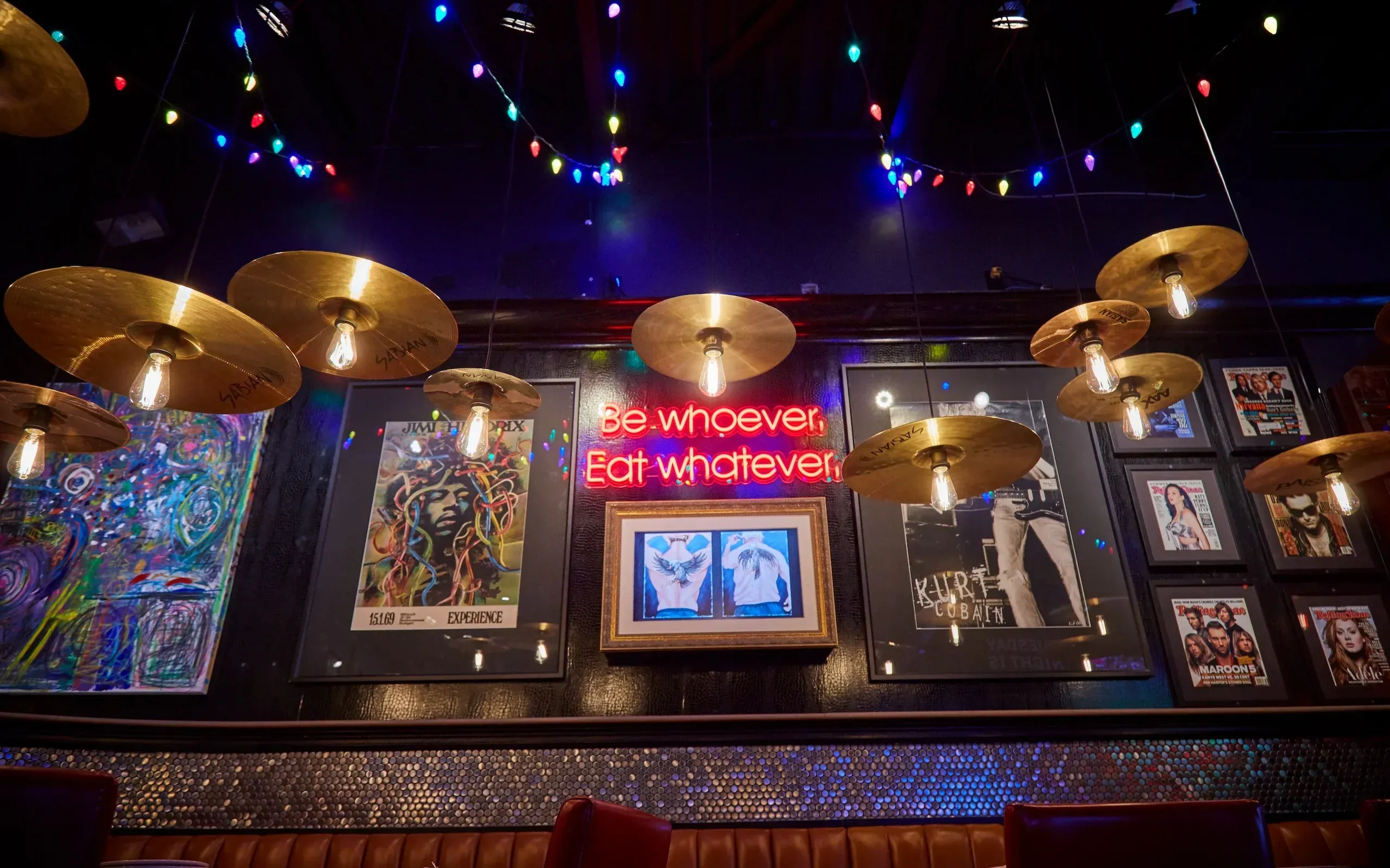 Close-up of provocative "Be whatever, eat whatever" brand messaging integrated into the new Jack Astor's interior wall design